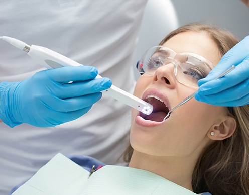 Dentist capturing intraoral images