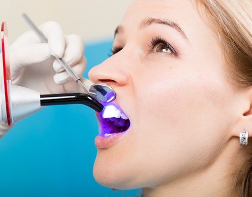 Woman receiving cosmetic dental bonding