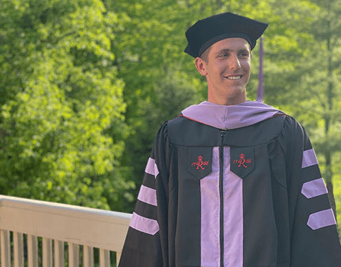 Doctor Zachary Goldstein in graduation cap and gown