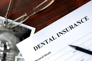 dental insurance form on table