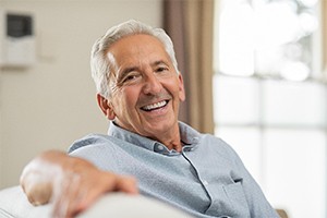 Smiling older man with dental implants in Randolph