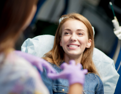 A photo of a smiling woman