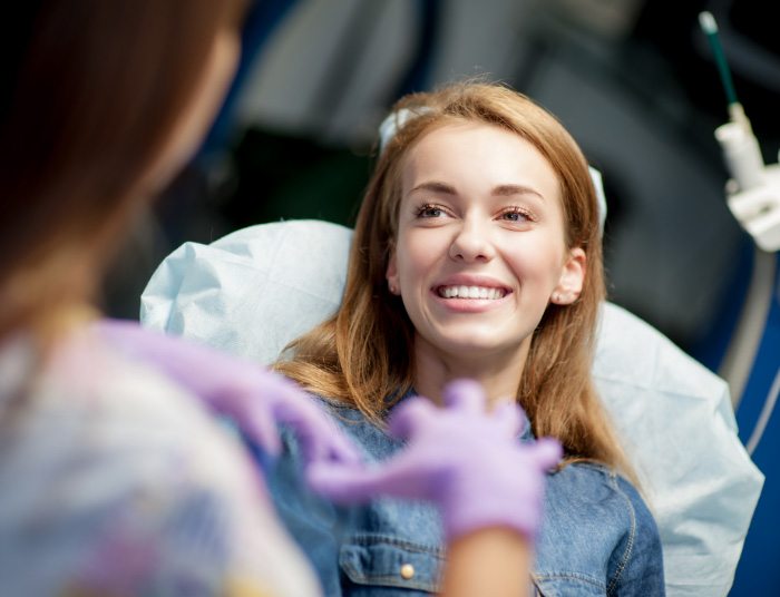 A photo of a smiling woman