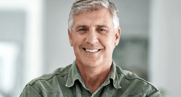 Man smiling after restorative dentistry