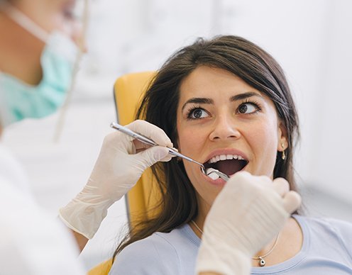 Woman receiving root canal therapy