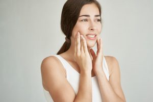 woman with dental pain