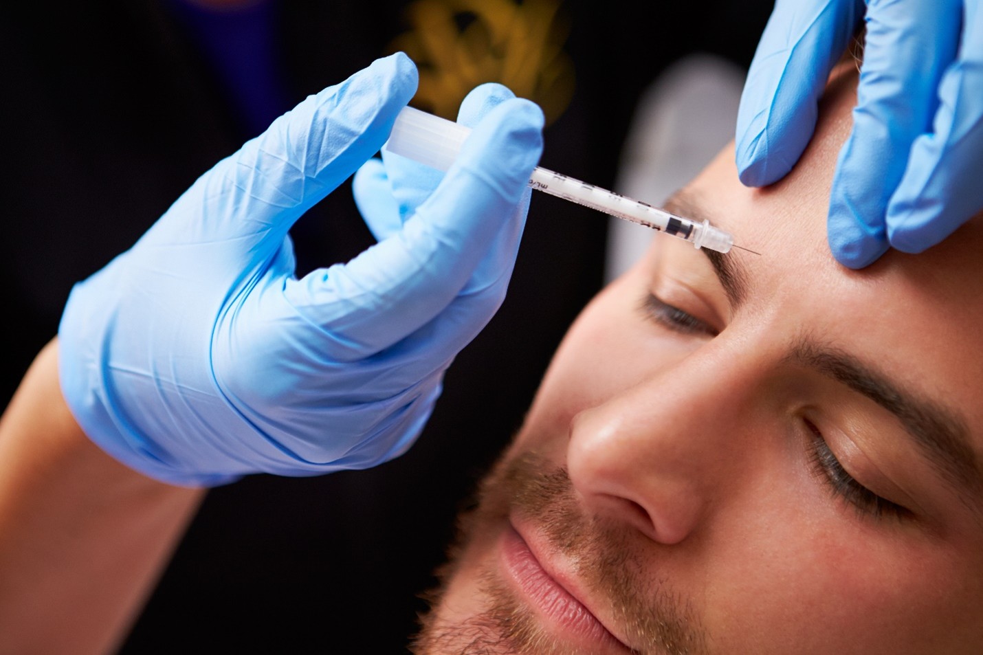 A man receiving BOTOX