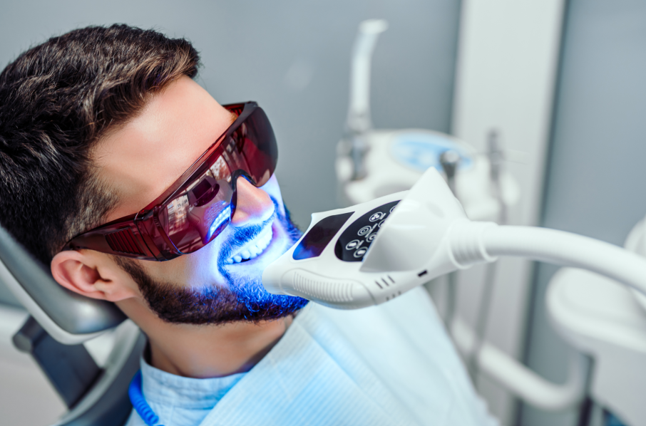 Man undergoing whitening treatment